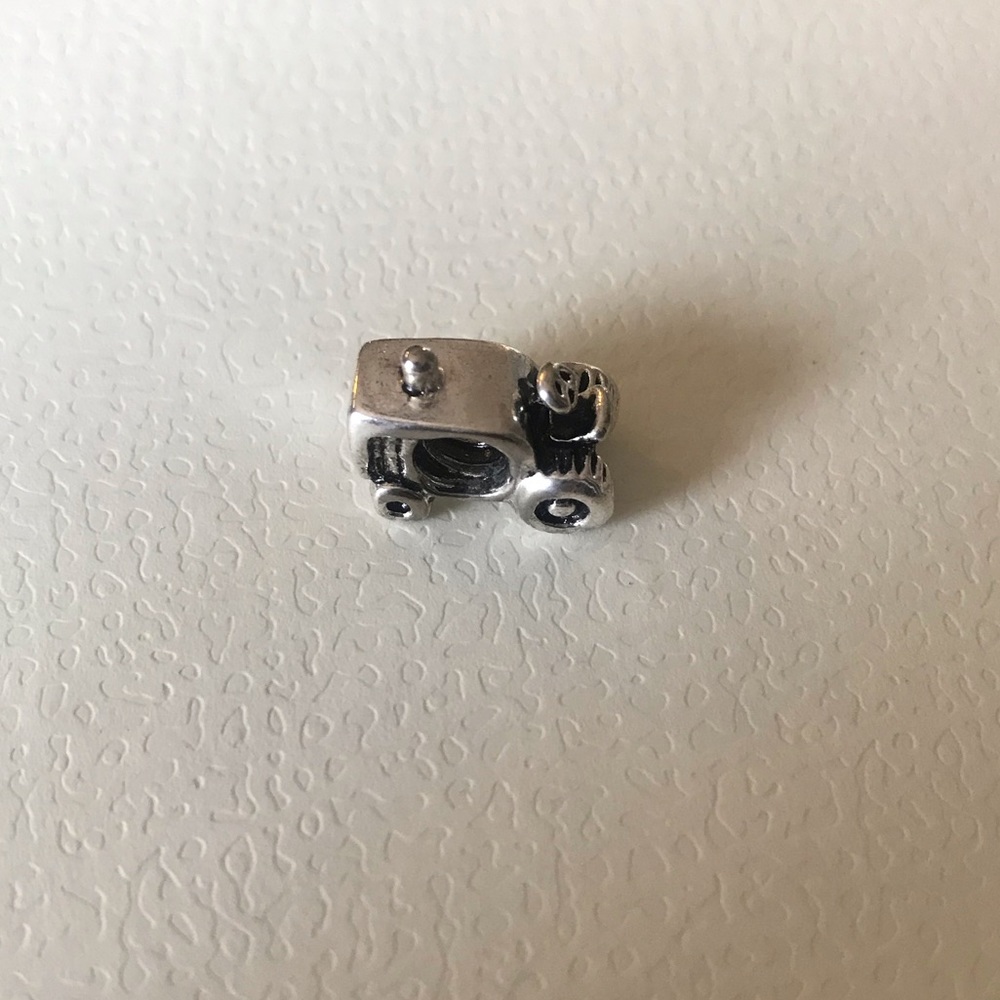 Pandora tractor charm